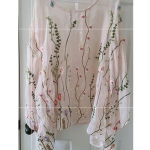 Pale pink poncho blouse with floral. Plus size 3x.